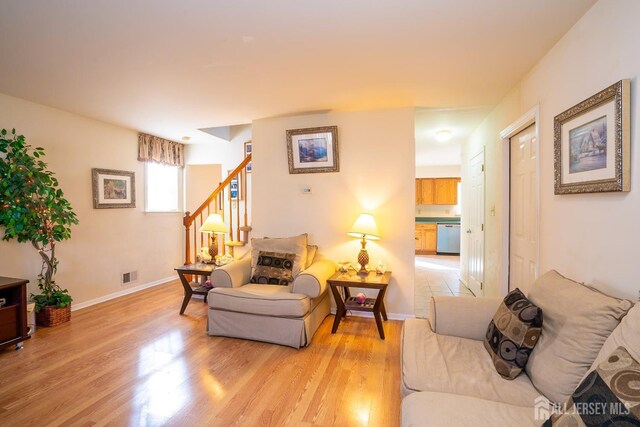 living room featuring light wood-type flooring