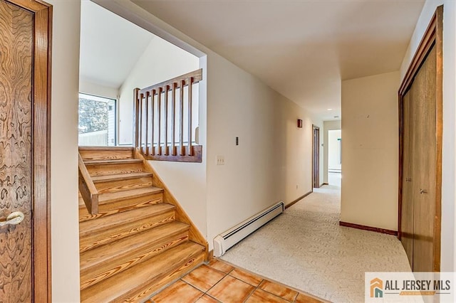 interior space featuring a baseboard heating unit, stairway, and light colored carpet