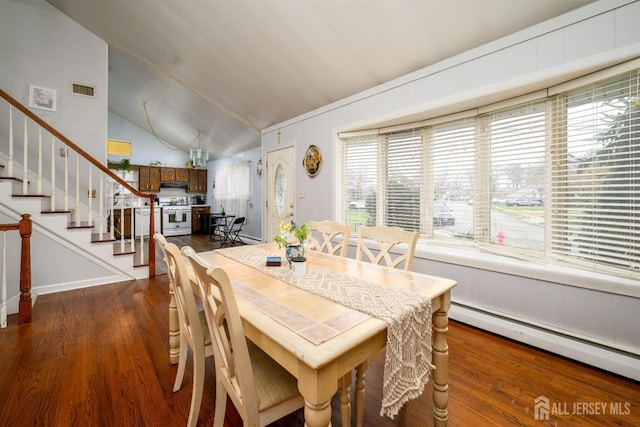 dining space with baseboard heating, vaulted ceiling, stairs, dark wood finished floors, and visible vents