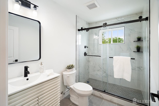 695 Inman Ave, Colonia, NJ 07067 - bathroom featuring vanity, a marble finish shower, and tile patterned flooring
