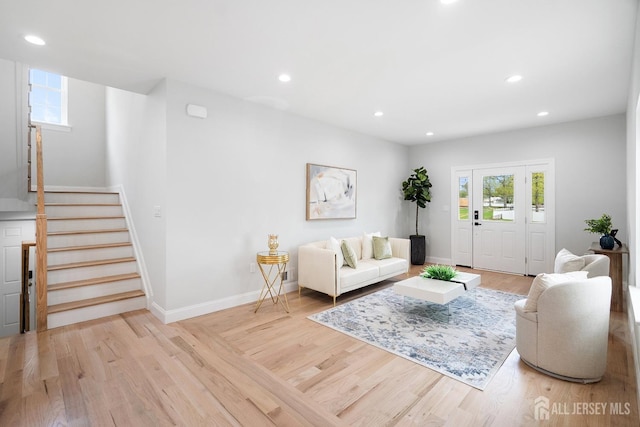 695 Inman Ave, Colonia, NJ 07067 - living room featuring stairway, recessed lighting, and light wood-style floors