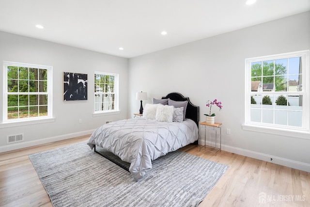 695 Inman Ave, Colonia, NJ 07067 - bedroom featuring light wood-style flooring and recessed lighting