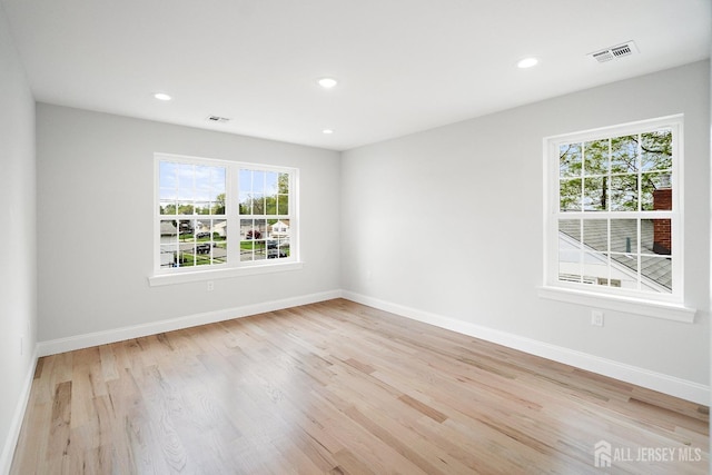 695 Inman Ave, Colonia, NJ 07067 - unfurnished room with plenty of natural light, light wood finished floors, and recessed lighting