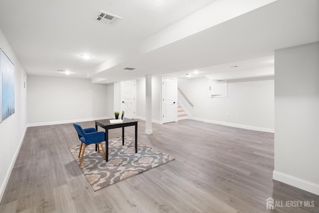 695 Inman Ave, Colonia, NJ 07067 - playroom with wood finished floors and baseboards