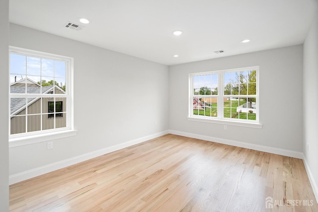 695 Inman Ave, Colonia, NJ 07067 - empty room featuring wood finished floors and recessed lighting