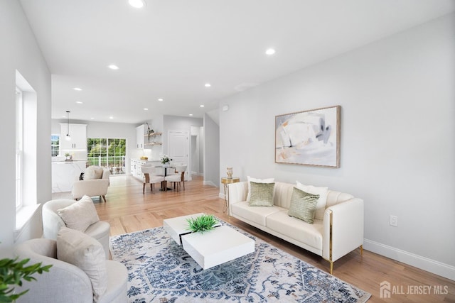 695 Inman Ave, Colonia, NJ 07067 - living room with light wood-type flooring and recessed lighting