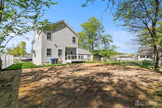 695 Inman Ave, Colonia, NJ 07067 - rear view of house with a deck