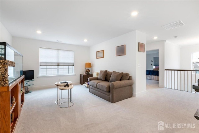 living room with light carpet