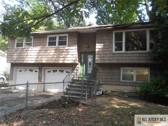 bi-level home with a garage