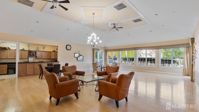 2024 Edward Stec Blvd, Edison, NJ 08837 - living area with ceiling fan, light wood-style flooring, a chandelier, and a high ceiling