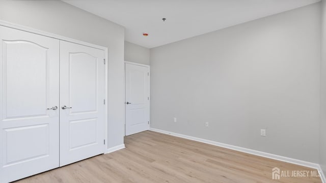 2024 Edward Stec Blvd, Edison, NJ 08837 - unfurnished bedroom featuring light wood finished floors and a closet