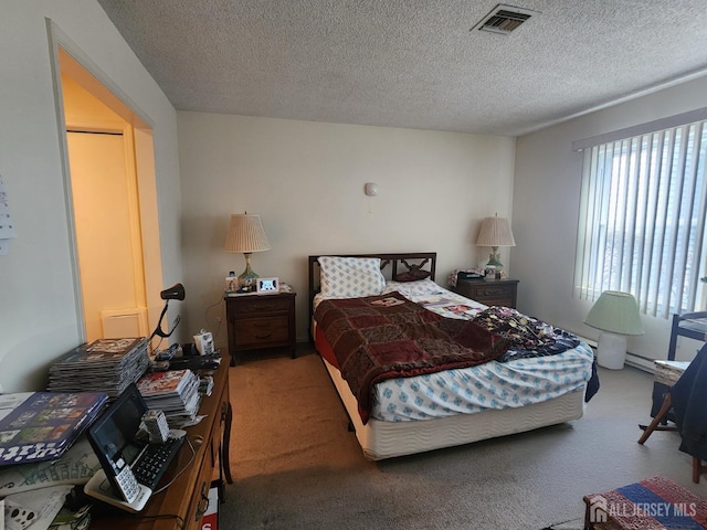309-C Sharon Way, Monroe, NJ 08831 - bedroom with carpet floors and a textured ceiling