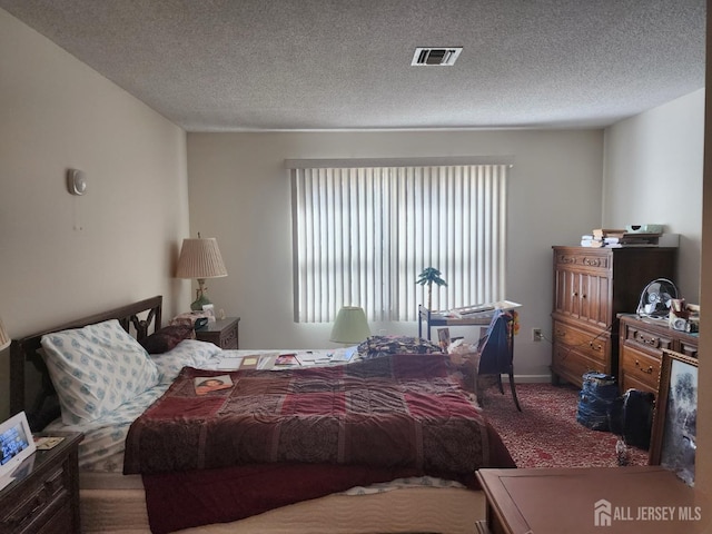 309-C Sharon Way, Monroe, NJ 08831 - bedroom with carpet, a textured ceiling, and baseboards