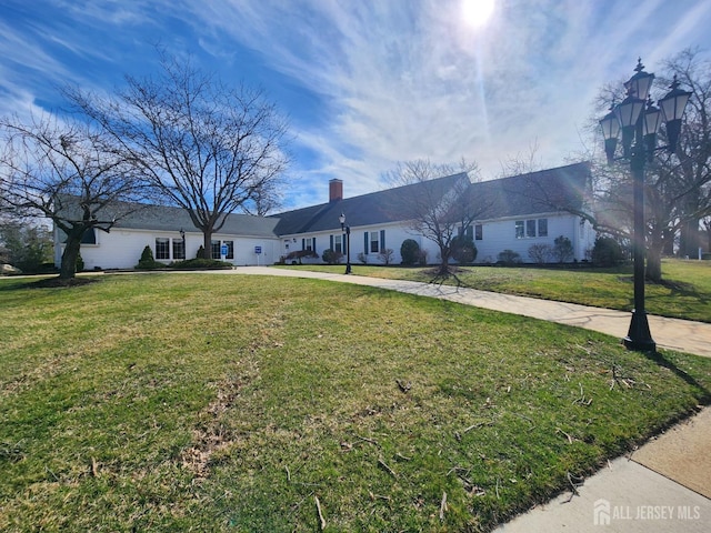 309-C Sharon Way, Monroe, NJ 08831 - single story home with a front yard and a chimney