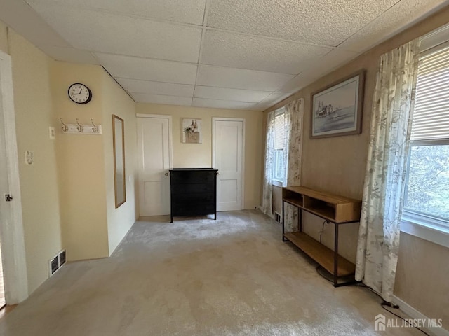 1515 Thomas Ave, North Brunswick, NJ 08902 - foyer with light colored carpet and a drop ceiling
