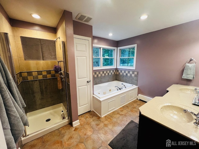 full bath featuring a sink, visible vents, a baseboard radiator, a shower stall, and a whirlpool tub