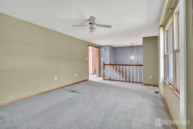 250 Adirondack Ave, Spotswood, NJ 08884 - carpeted spare room with a ceiling fan and baseboards