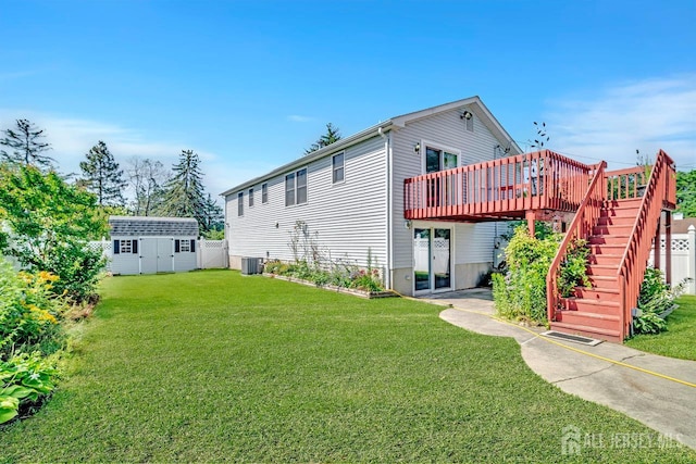 250 Adirondack Ave, Spotswood, NJ 08884 - rear view of property with a shed, a wooden deck, a lawn, and stairway