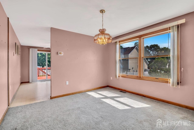250 Adirondack Ave, Spotswood, NJ 08884 - unfurnished room with carpet and a chandelier