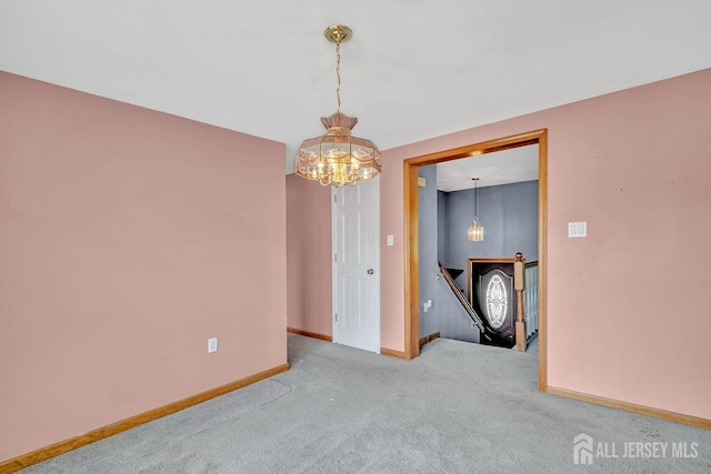 250 Adirondack Ave, Spotswood, NJ 08884 - carpeted spare room featuring a chandelier and baseboards