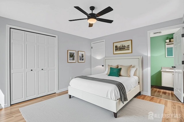 250 Adirondack Ave, Spotswood, NJ 08884 - bedroom with light wood-type flooring, ceiling fan, and ensuite bath