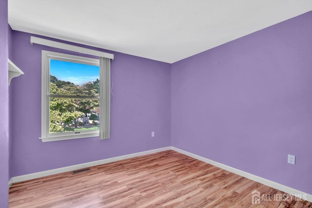 250 Adirondack Ave, Spotswood, NJ 08884 - spare room with wood finished floors and baseboards