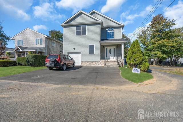 view of front of home with a garage