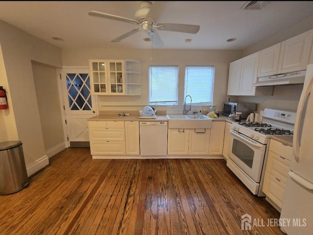 kitchen with a ceiling fan, a sink, white appliances, white cabinetry, and under cabinet range hood
