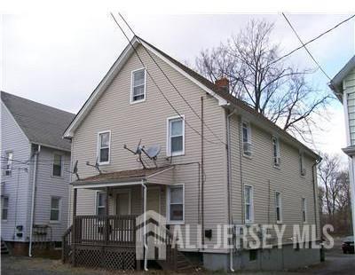 19 Haag St, Sayreville, NJ 08872 - rear view of property with a porch and a chimney