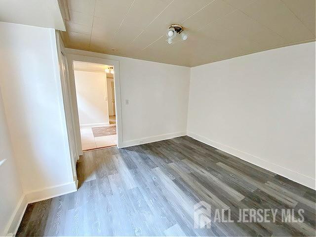 19 Haag St, Sayreville, NJ 08872 - unfurnished room with wood finished floors and baseboards