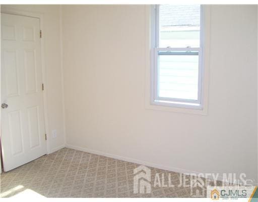 19 Haag St, Sayreville, NJ 08872 - empty room with baseboards
