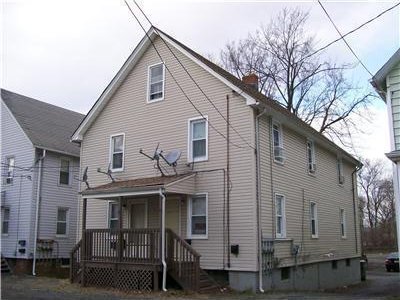 19 Haag St, Sayreville, NJ 08872 - rear view of property featuring a porch and a chimney