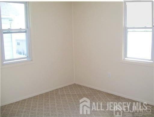 19 Haag St, Sayreville, NJ 08872 - spare room with baseboards