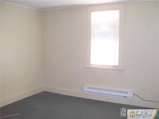19 Haag St, Sayreville, NJ 08872 - empty room with a baseboard heating unit and baseboards