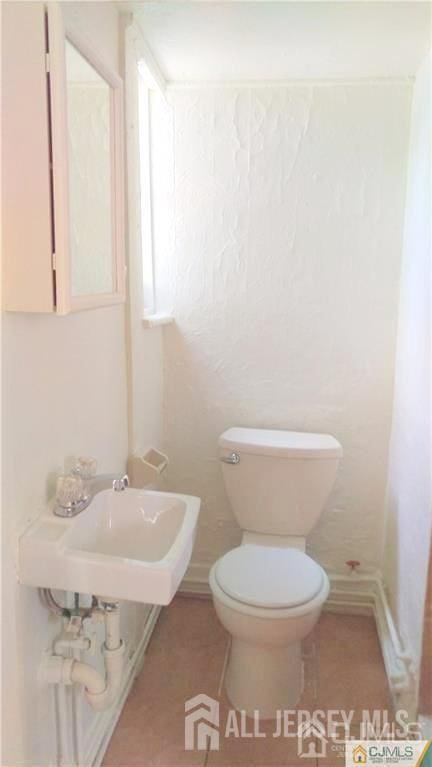 19 Haag St, Sayreville, NJ 08872 - bathroom with toilet and a sink