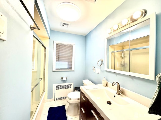 bathroom featuring a shower stall, tile patterned floors, vanity, radiator, and visible vents
