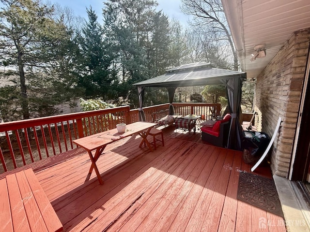 wooden terrace with a gazebo