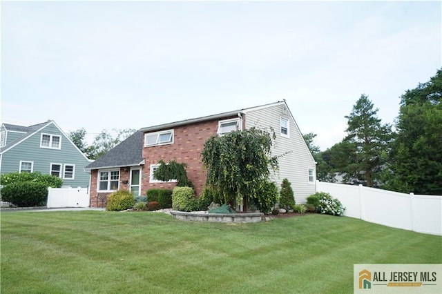 313 Demorest Ave, Avenel, NJ 07001 - rear view of property with brick siding