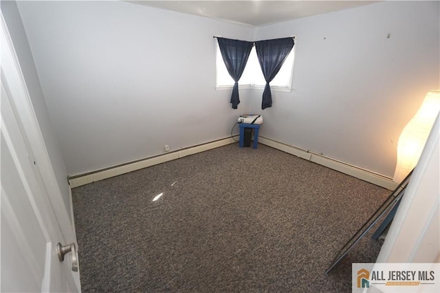 313 Demorest Ave, Avenel, NJ 07001 - unfurnished room featuring a baseboard heating unit and baseboards