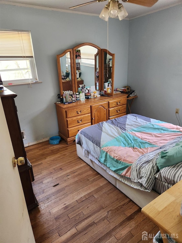 20 Dogwood Dr, Jackson, NJ 08527 - bedroom featuring wood finished floors, crown molding, a ceiling fan, and arched walkways