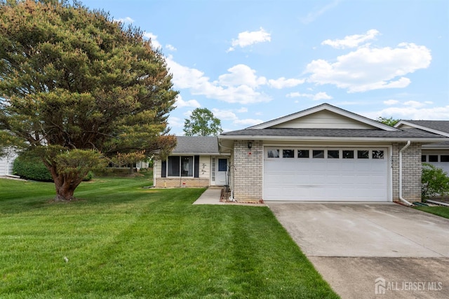 209-A Vernon Rd, Monroe, NJ 08831 - ranch-style home with an attached garage, brick siding, driveway, and a front lawn