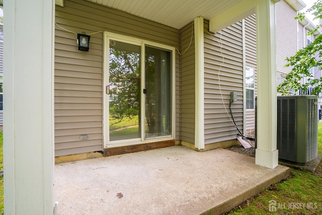 85 W Shrewsbury Pl, Princeton, NJ 08540 - view of exterior entry with central air condition unit and a patio area