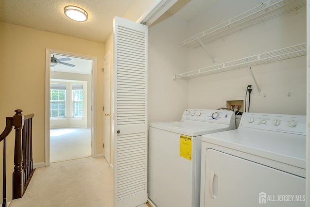 85 W Shrewsbury Pl, Princeton, NJ 08540 - laundry room with washing machine and dryer, light colored carpet, a ceiling fan, and baseboards