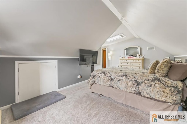 111 E 5th Ave, Port Reading, NJ 07064 - carpeted bedroom with lofted ceiling and baseboards
