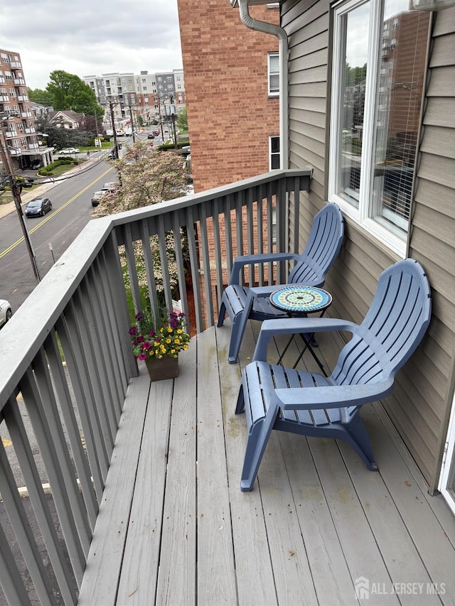 deck featuring a view of city