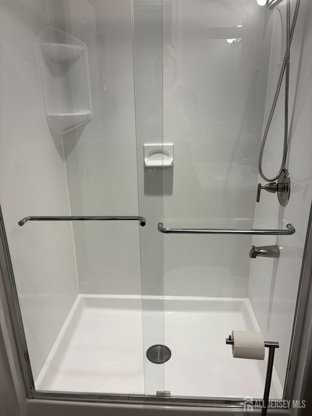 bathroom featuring a stall shower