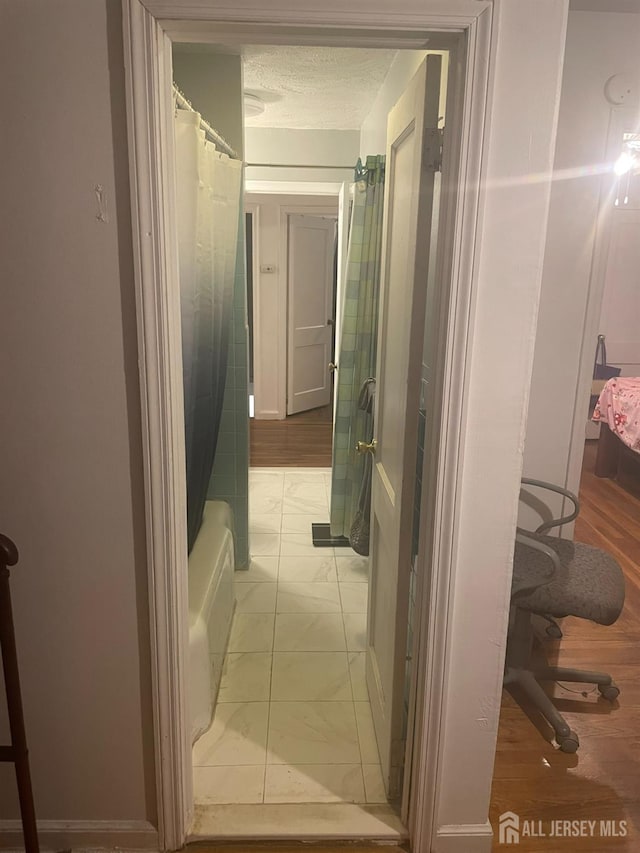 131 Berkeley Ter, Plainfield, NJ 07062 - full bathroom featuring marble finish floors and a textured ceiling