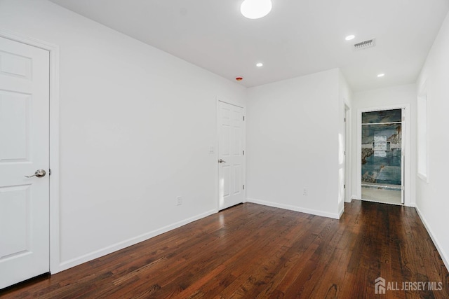 2 Buttonwood Dr, Parlin, NJ 08859 - unfurnished room with wood finished floors, baseboards, and recessed lighting