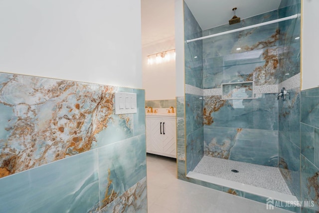 2 Buttonwood Dr, Parlin, NJ 08859 - bathroom featuring tiled shower, vanity, and tile patterned flooring