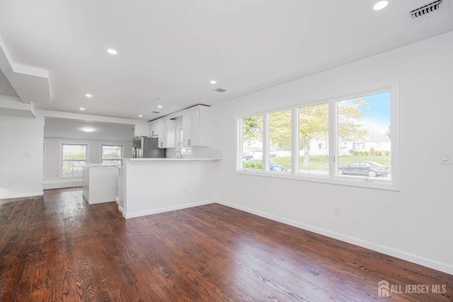 2 Buttonwood Dr, Parlin, NJ 08859 - unfurnished living room featuring recessed lighting, baseboards, and dark wood finished floors